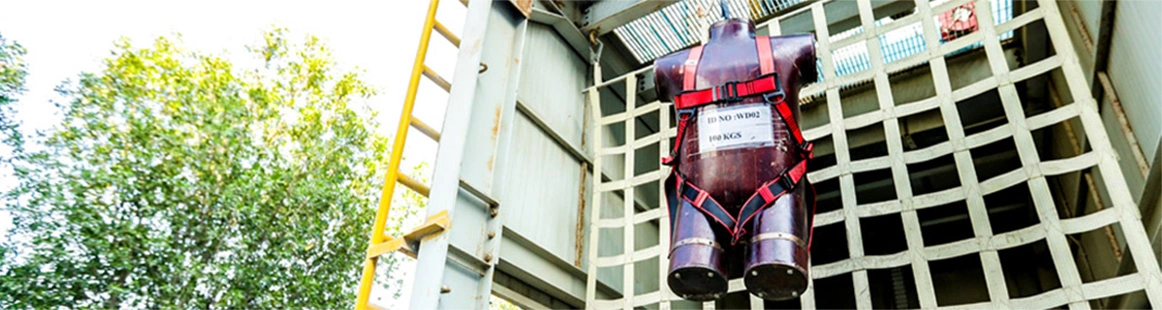  safety harness during drop test on webbing net