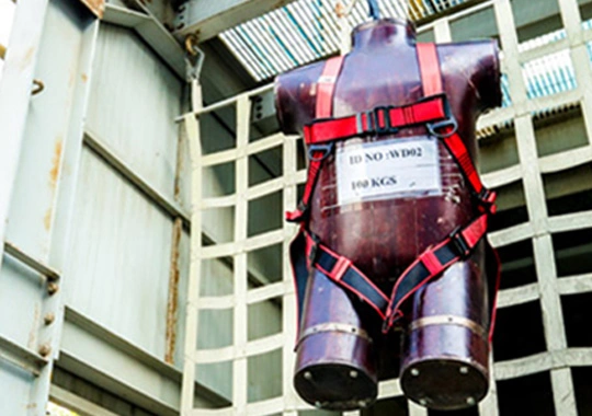  safety harness during drop test on webbing net