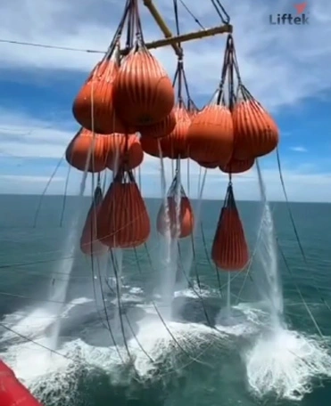 Water being discharged from liftek waterbags after offshore load test