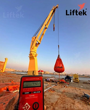 Conducting crane testing using waterbag load